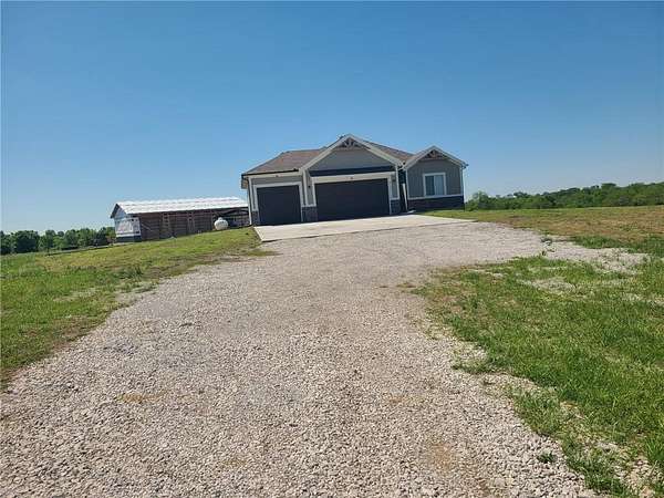 22 Acres of Land with Home for Sale in Peculiar, Missouri