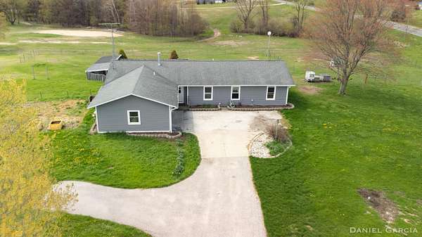 2 Acres of Land with Home for Sale in Walkerville, Michigan