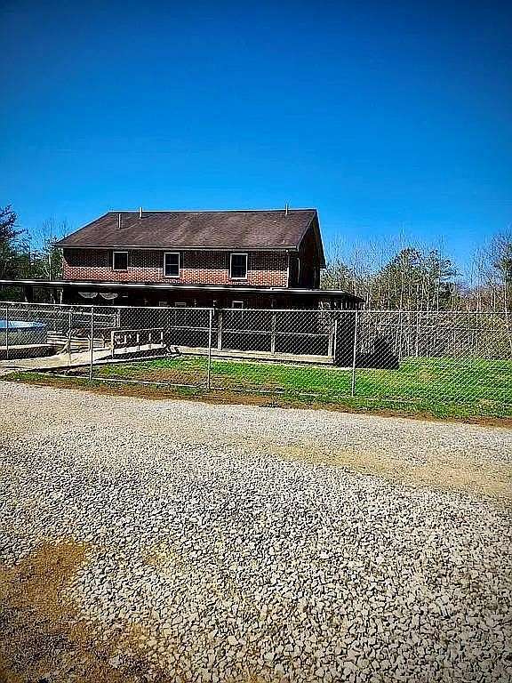 7.6 Acres of Land with Home for Sale in Campton, Kentucky