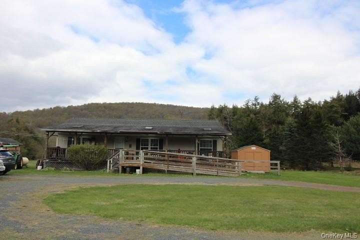 6.69 Acres of Land with Home for Sale in Livingston Manor, New York