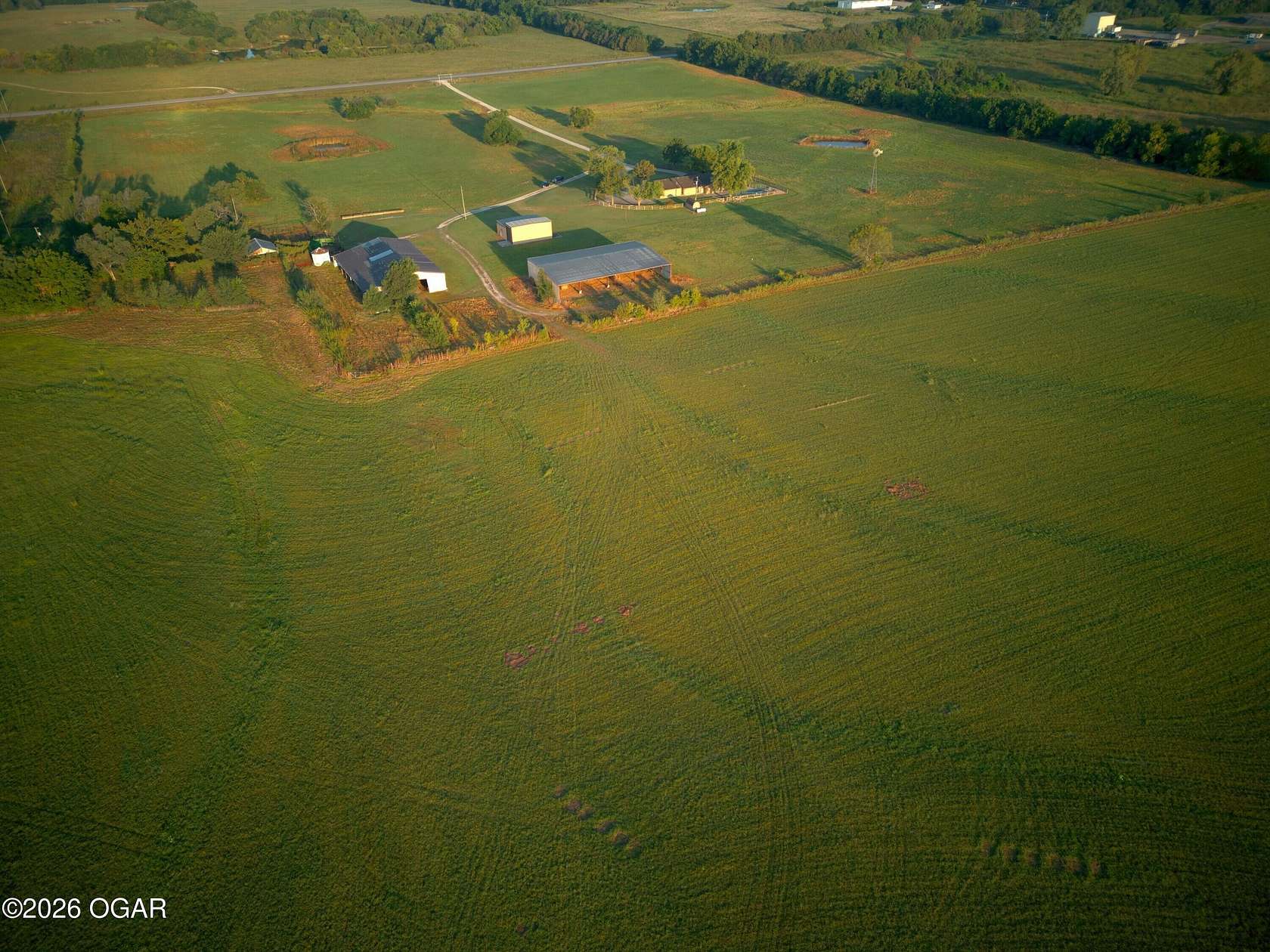 120 Acres of Agricultural Land with Home for Sale in Parsons, Kansas