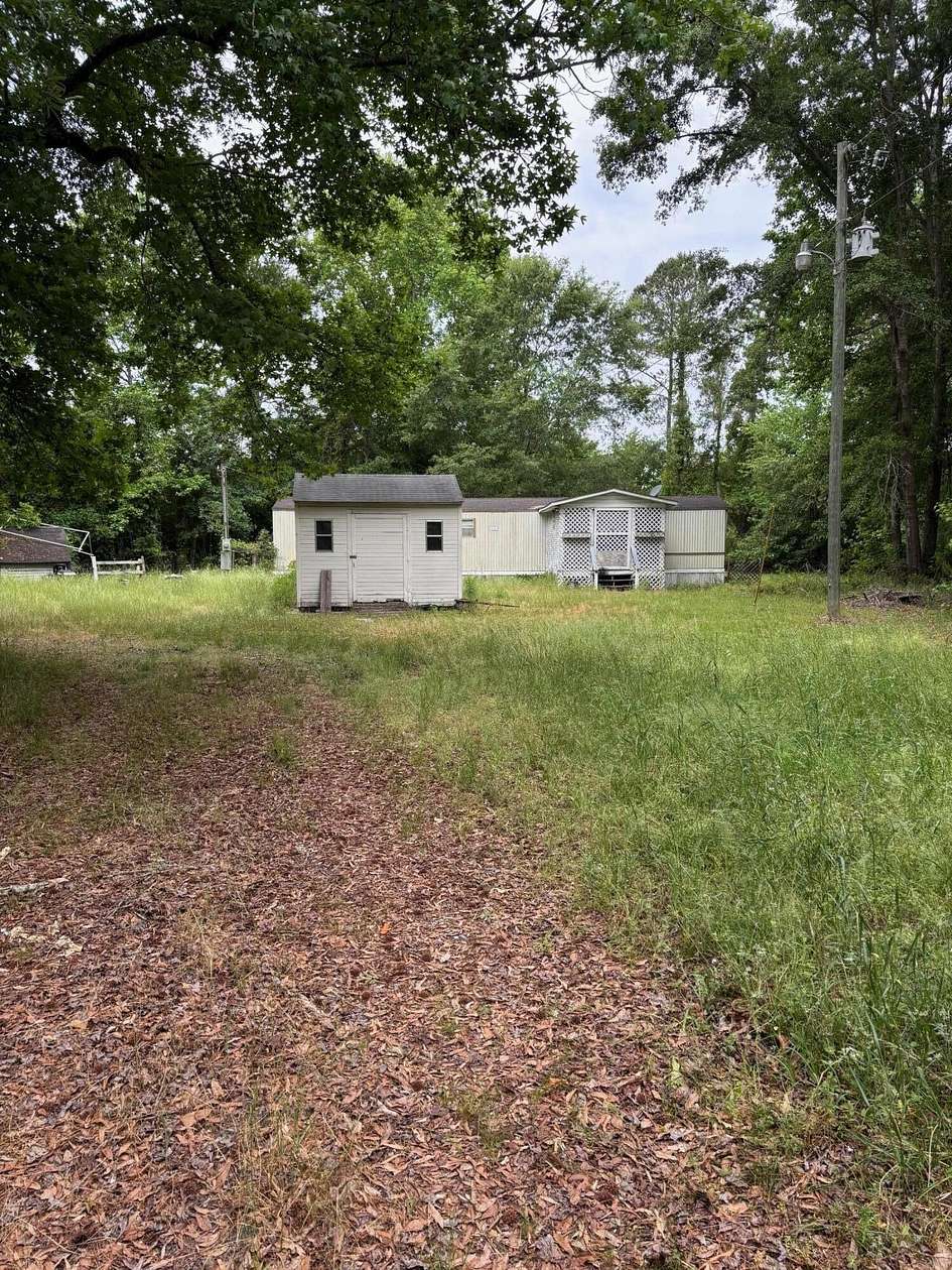 2.3 Acres of Land with Home for Sale in Alcolu, South Carolina