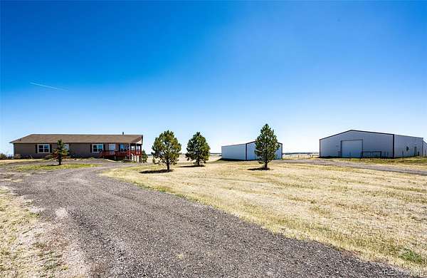 35 Acres of Agricultural Land with Home for Sale in Elizabeth, Colorado