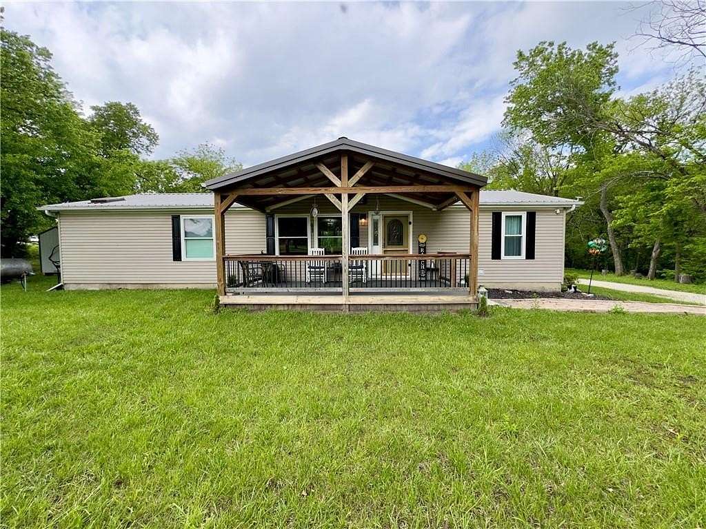 8 Acres of Land with Home for Sale in Garden City, Missouri