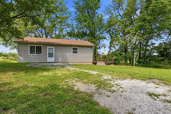 1.65 Acres of Land with Home for Sale in Dadeville, Missouri