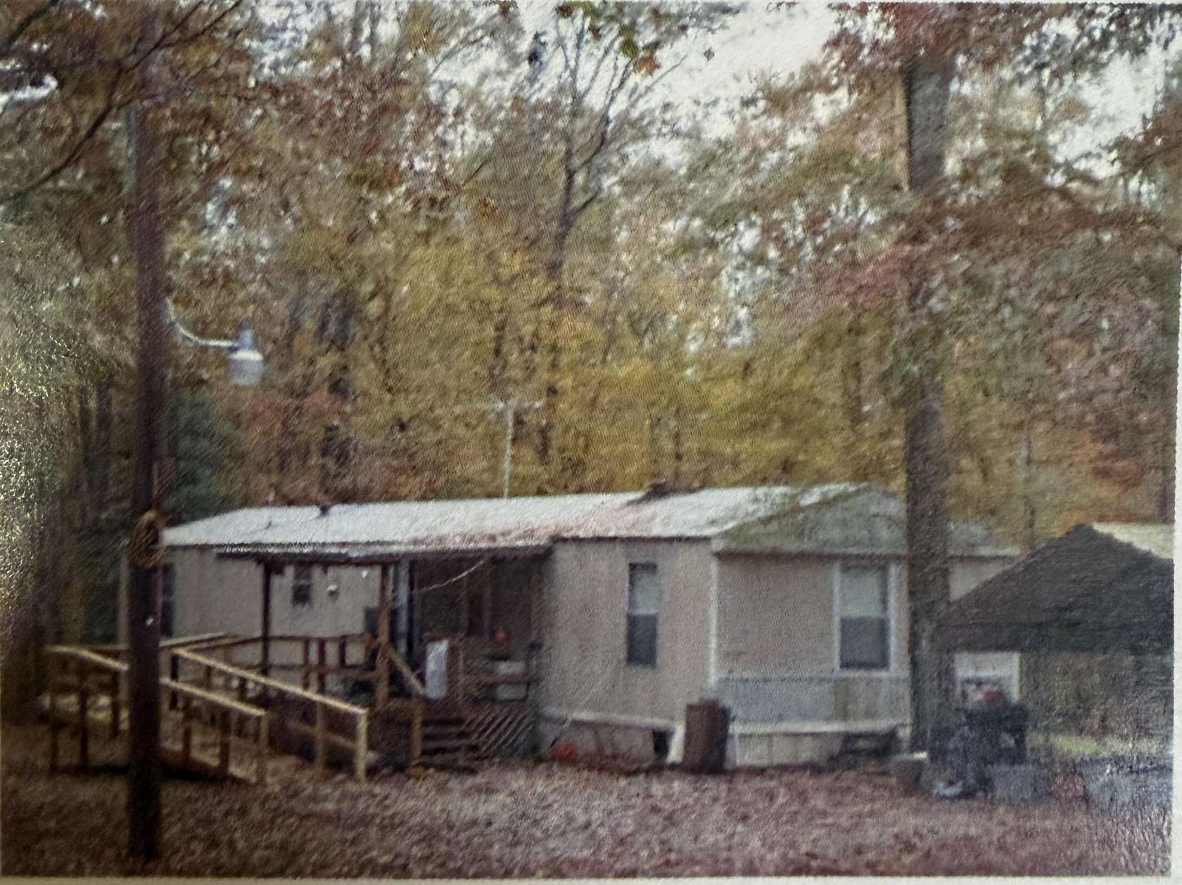 7.19 Acres of Land with Home for Sale in Traskwood, Arkansas