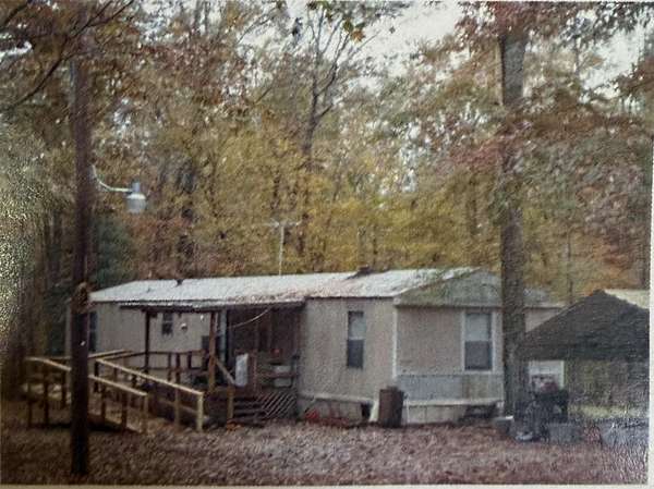 7.19 Acres of Land with Home for Sale in Traskwood, Arkansas