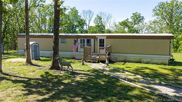 10.5 Acres of Recreational Land with Home for Sale in Barnett, Missouri