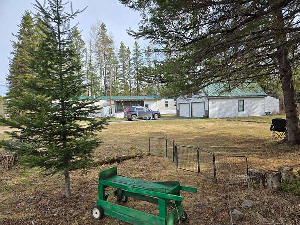 1.5 Acres of Land with Home for Sale in Caribou, Maine