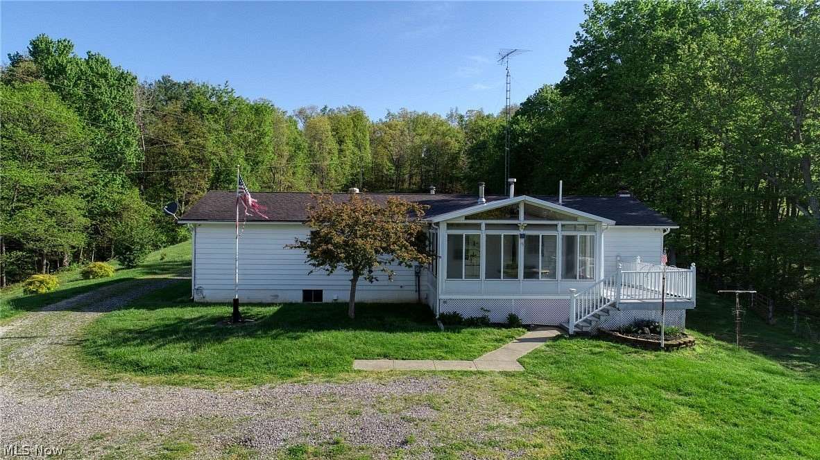 6 Acres of Land with Home for Sale in Cambridge, Ohio