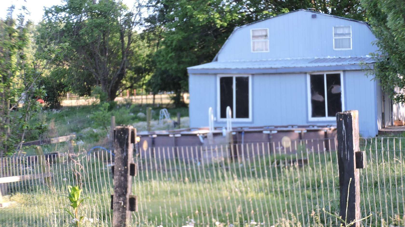 10 Acres of Land with Home for Sale in Sharpsburg, Kentucky