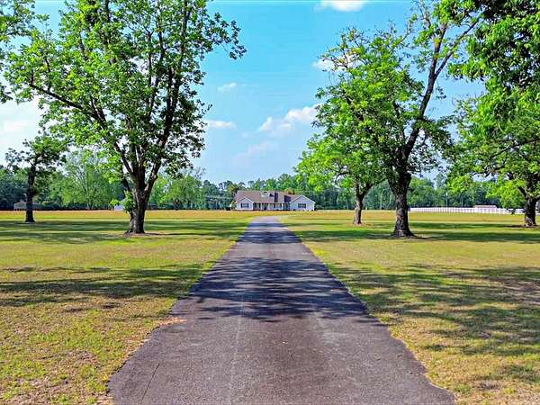 28.6 Acres of Recreational Land with Home for Sale in Adel, Georgia