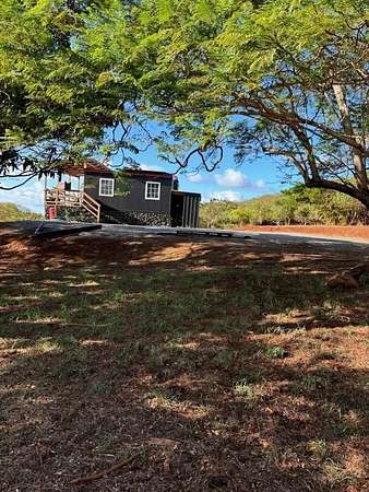 7.34 Acres of Land with Home for Sale in Maunaloa, Hawaii