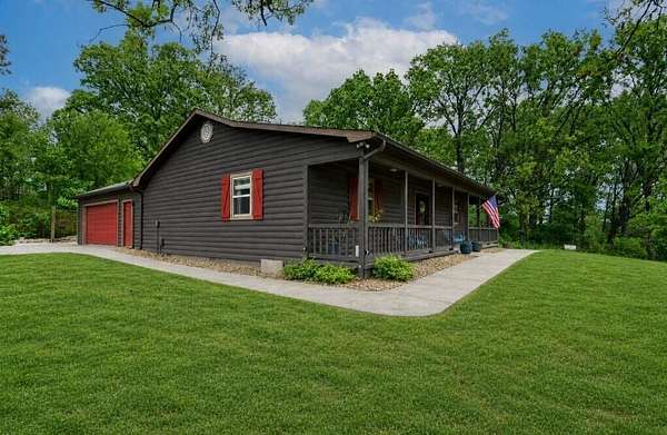 9.8 Acres of Land with Home for Sale in Cassville, Missouri