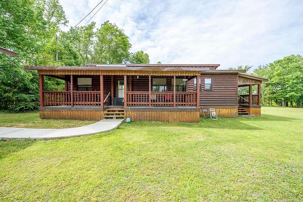 5 Acres of Land with Home for Sale in Adamsville, Tennessee