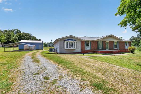 5 Acres of Land with Home for Sale in Portland, Tennessee