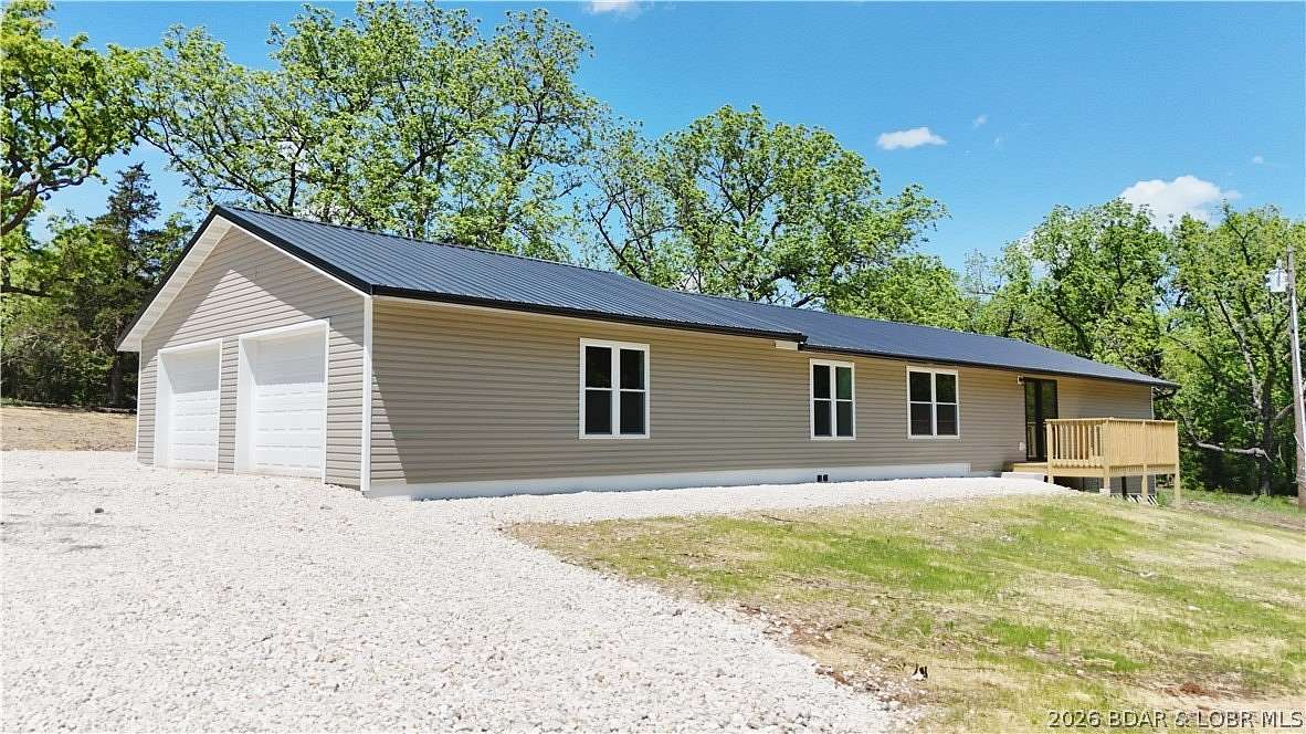 6.9 Acres of Land with Home for Sale in Eldon, Missouri