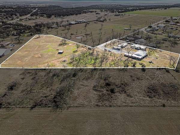 5.58 Acres of Land with Home for Sale in Mineral Wells, Texas