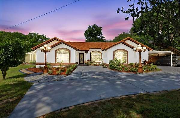 9.7 Acres of Land with Home for Sale in De Leon Springs, Florida