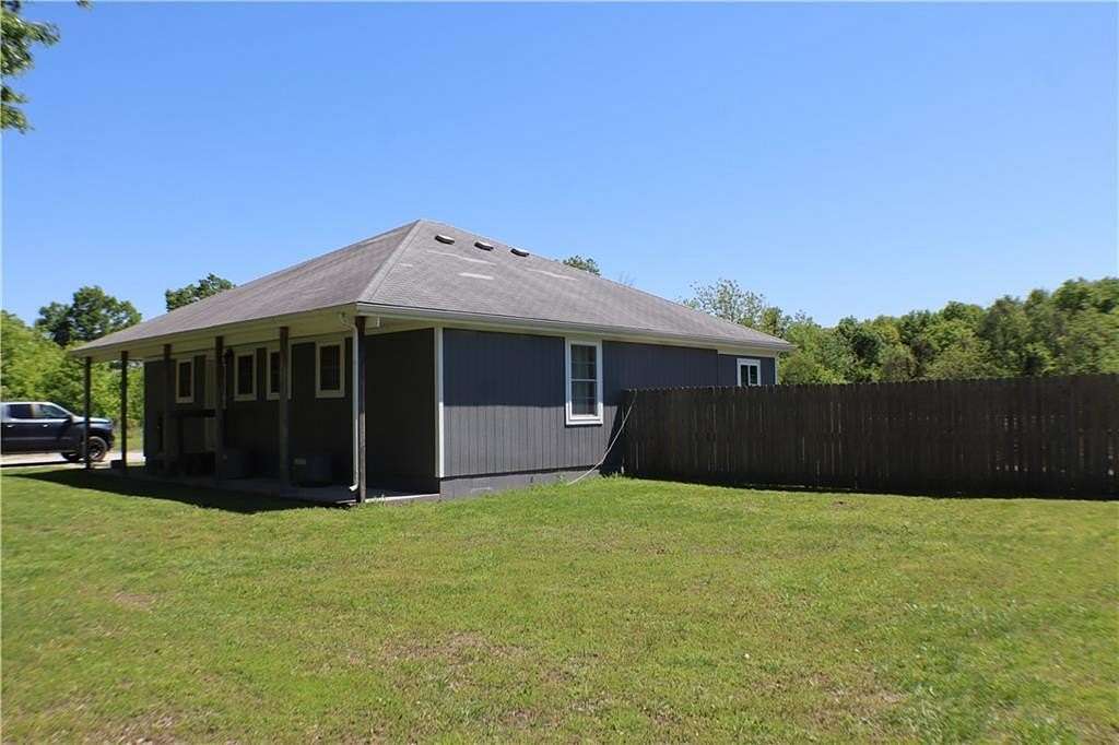 7.9 Acres of Land with Home for Sale in Garden City, Missouri