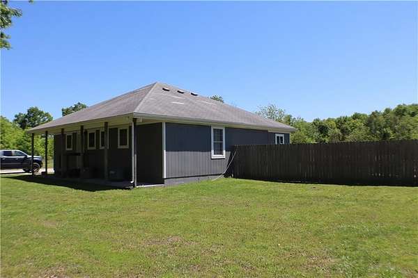 7.9 Acres of Land with Home for Sale in Garden City, Missouri