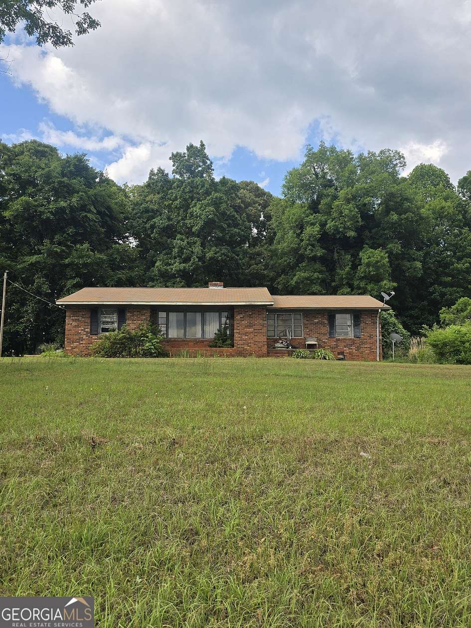 16.1 Acres of Land with Home for Sale in Carnesville, Georgia