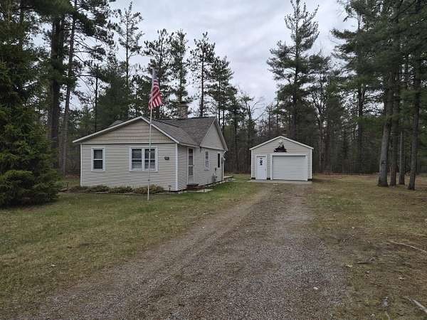 1.84 Acres of Land with Home for Sale in Lewiston, Michigan