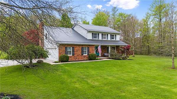 5 Acres of Land with Home for Sale in Aurora, Ohio
