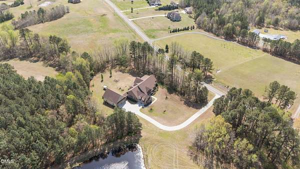 7 Acres of Land with Home for Sale in Oxford, North Carolina