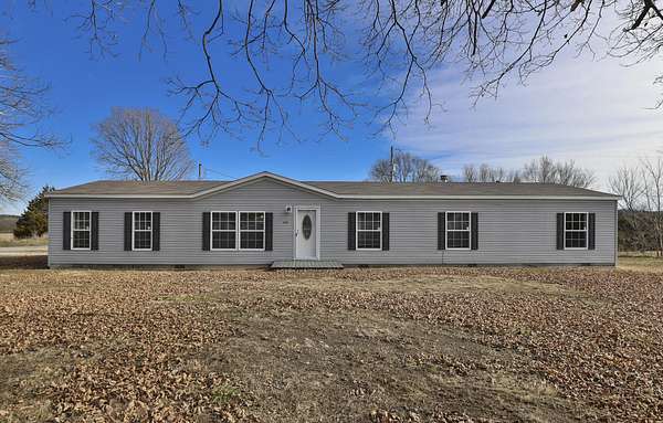 6 Acres of Land with Home for Sale in Humansville, Missouri