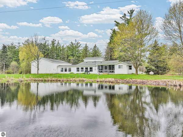 4 Acres of Land with Home for Sale in Manton, Michigan