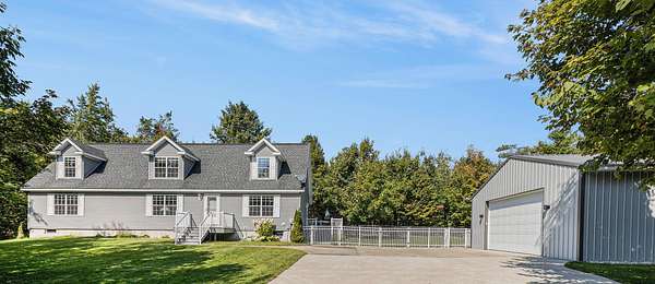2.42 Acres of Land with Home for Sale in Vanderbilt, Michigan