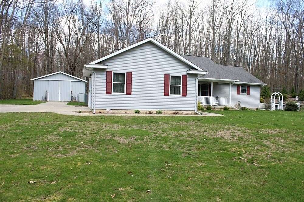 1.82 Acres of Land with Home for Sale in Harrison, Michigan