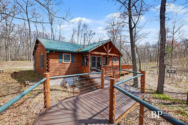 82 Acres of Recreational Land with Home for Sale in Bitely, Michigan