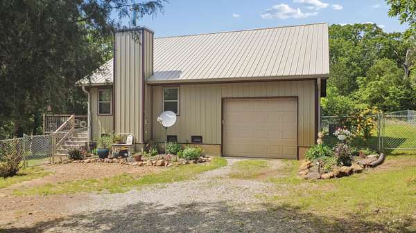 10 Acres of Recreational Land with Home for Sale in Dadeville, Missouri