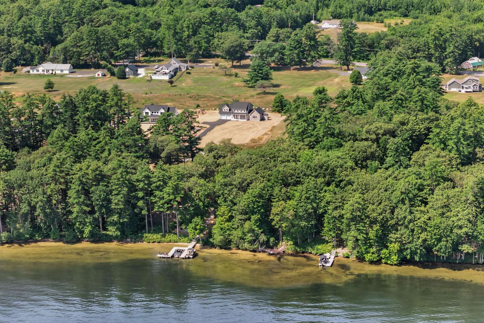 1.64 Acres of Land with Home for Sale in Naples, Maine