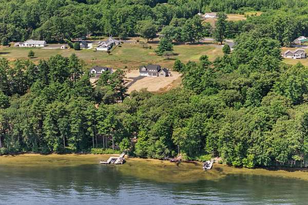 1.64 Acres of Land with Home for Sale in Naples, Maine