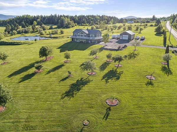 7.13 Acres of Land with Home for Sale in Colebrook, New Hampshire