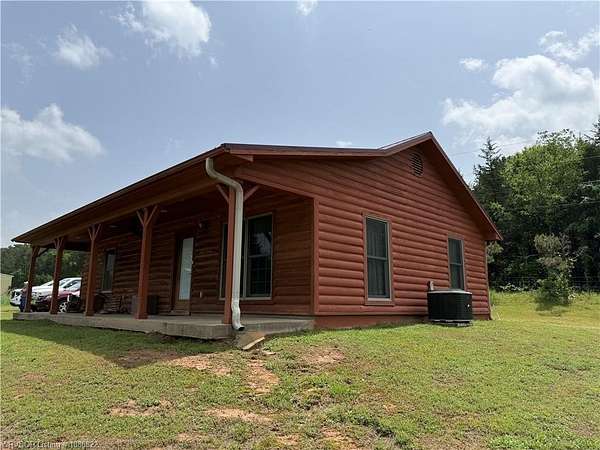 9.36 Acres of Land with Home for Auction in Paris, Arkansas