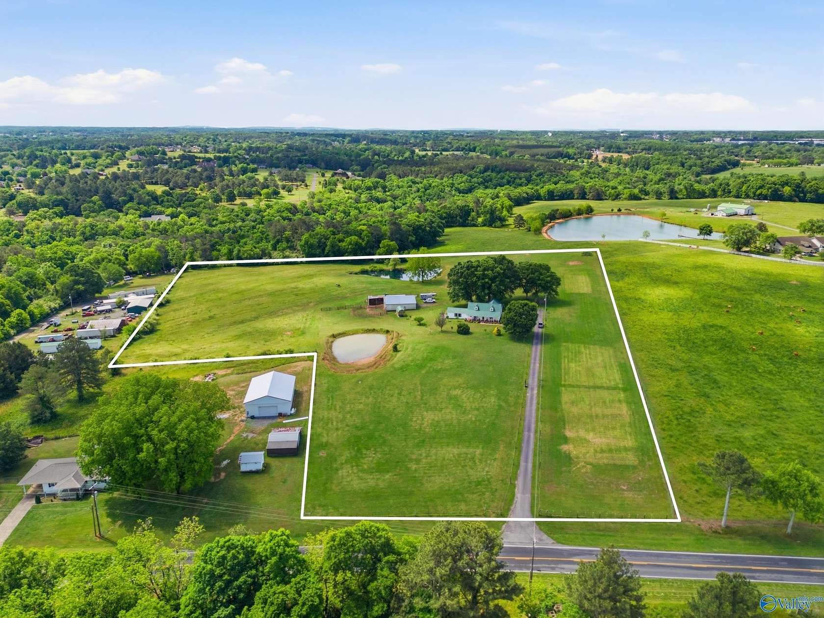14.4 Acres of Land with Home for Sale in Albertville, Alabama