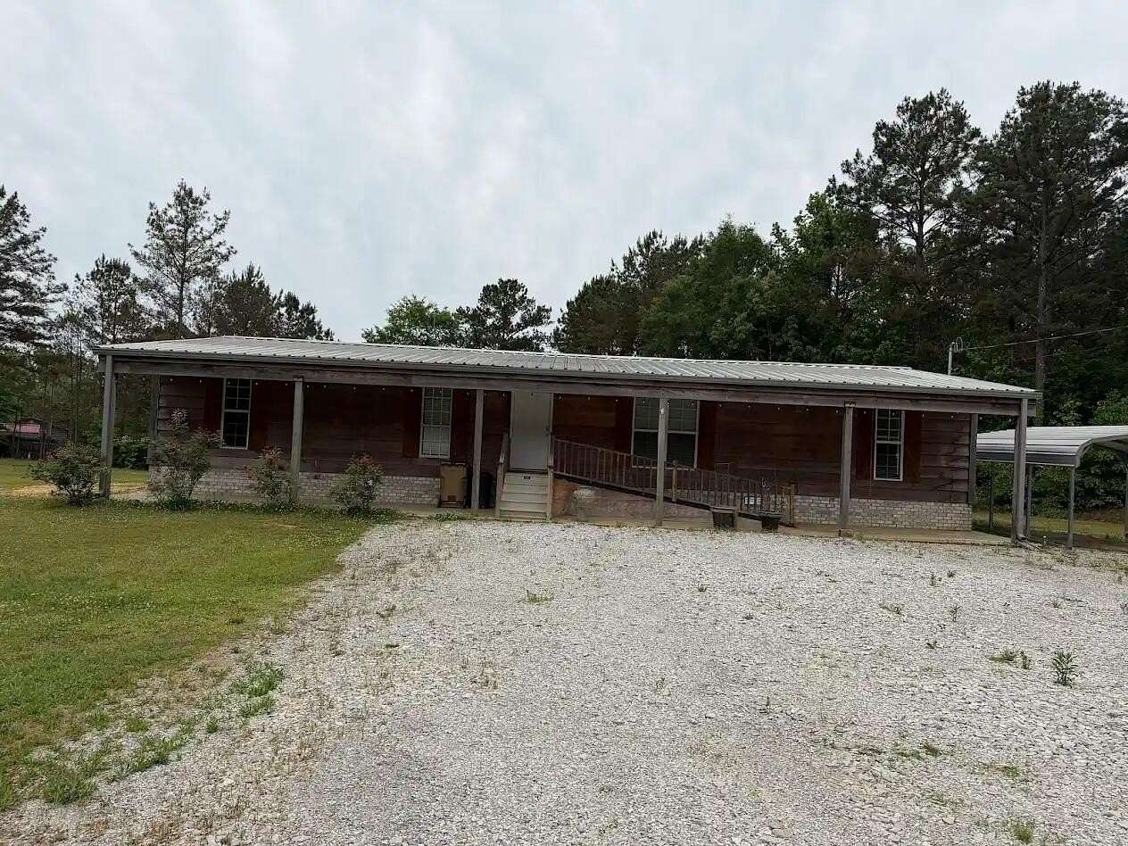 1.52 Acres of Land with Home for Sale in Marietta, Mississippi