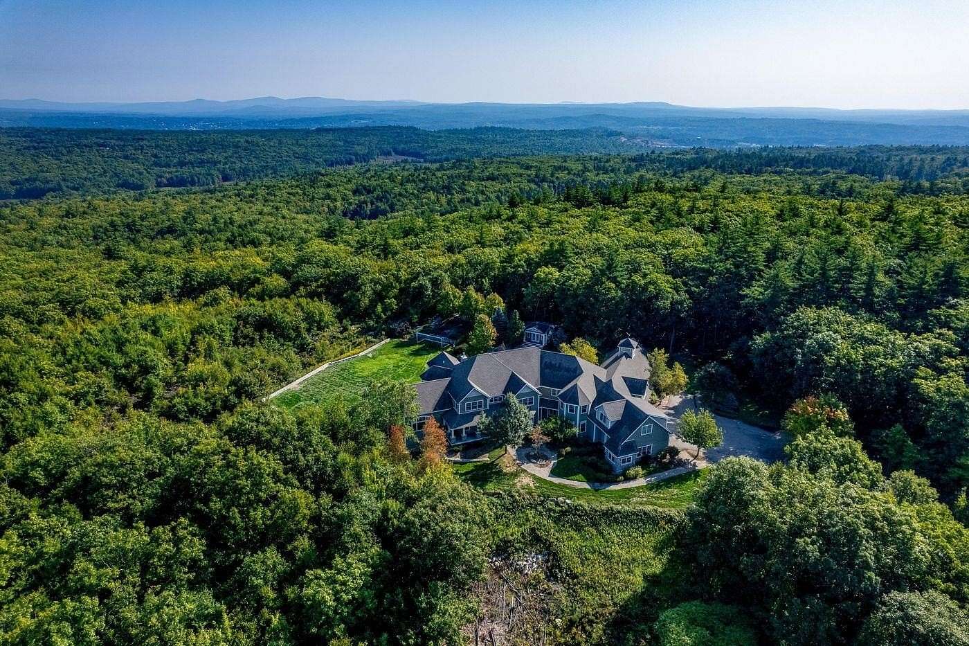 9.85 Acres of Land with Home for Sale in Bow Town, New Hampshire