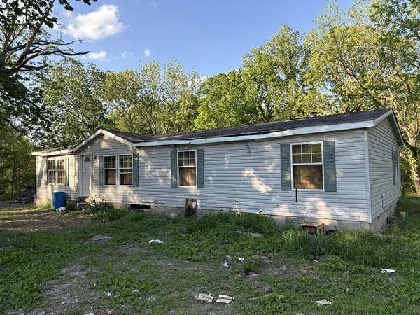 5.4 Acres of Land with Home for Sale in Cassville, Missouri