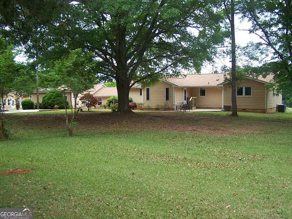 21 Acres of Agricultural Land with Home for Sale in Locust Grove, Georgia