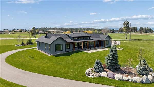 5 Acres of Land with Home for Sale in Kalispell, Montana