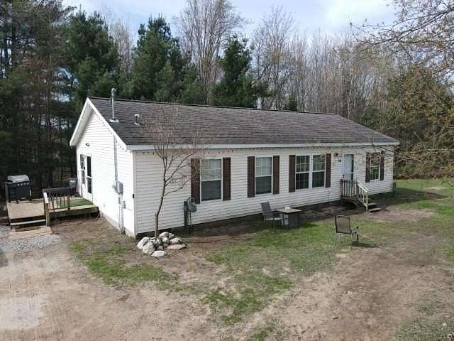 1.67 Acres of Land with Home for Sale in East Jordan, Michigan