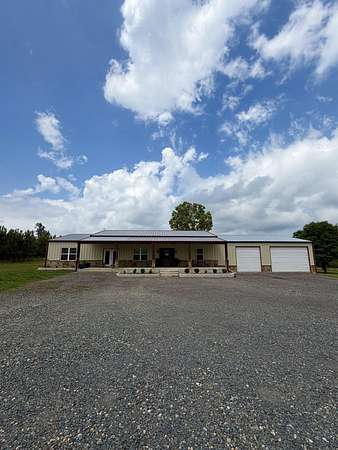 19.7 Acres of Land with Home for Sale in Queen City, Texas