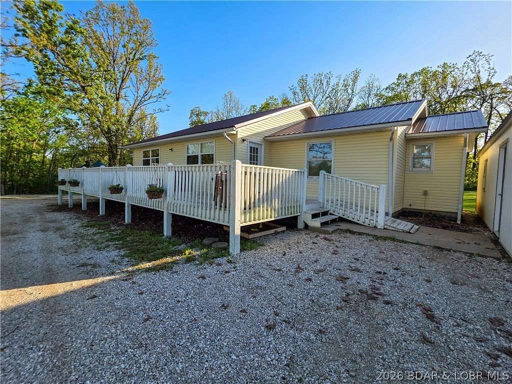 3.28 Acres of Land with Home for Sale in Versailles, Missouri