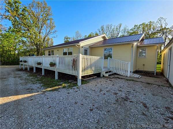 3.28 Acres of Land with Home for Sale in Versailles, Missouri