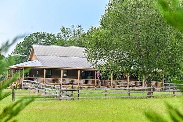16.2 Acres of Land with Home for Sale in Troy, Alabama